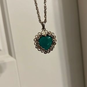 Green stone, bought at antique shop sterling silver?
